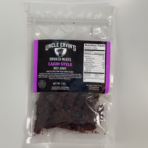 Package of Uncle Ervin's Cajun Style Beef Jerky in a clear bag on a white background